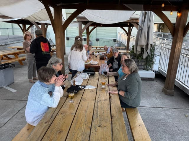 Club volunteers building relationships at a committee meeting